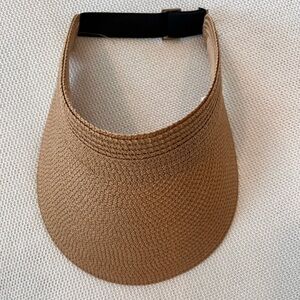 Woven visor with adjustable strap
